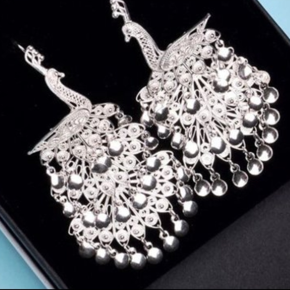 Silver peacock earrings